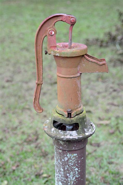 antique hand pump water|decorative old fashioned water pump.